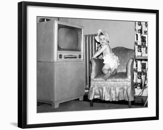 Baby Girl Wants to Watch Television, Ca. 1954-null-Framed Photographic Print