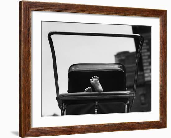Baby's Feet Peeking out of Carriage-Bettmann-Framed Photographic Print