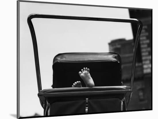 Baby's Feet Peeking out of Carriage-Bettmann-Mounted Photographic Print