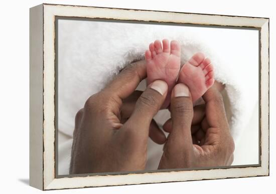 Baby's Feet-Ruth Jenkinson-Framed Premier Image Canvas