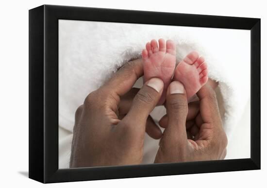 Baby's Feet-Ruth Jenkinson-Framed Premier Image Canvas