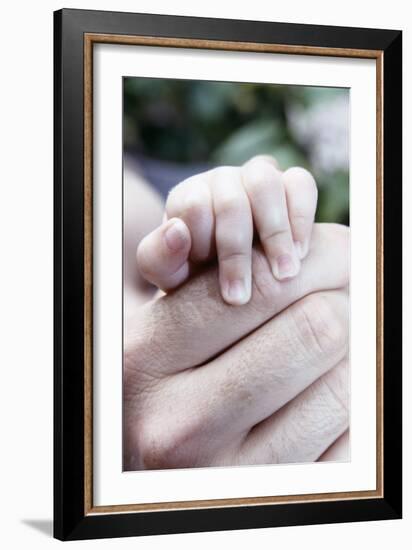 Baby's Hand-Cristina-Framed Photographic Print