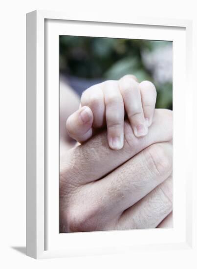 Baby's Hand-Cristina-Framed Photographic Print