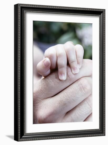 Baby's Hand-Cristina-Framed Photographic Print