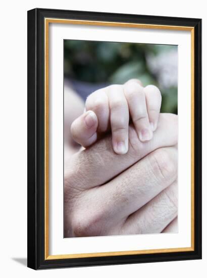 Baby's Hand-Cristina-Framed Photographic Print