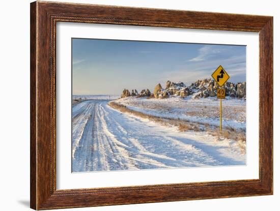 Back Country Road over Prairie at Natural Fort in Northern Colorado in Winter Scenery, a Road Sign-PixelsAway-Framed Photographic Print