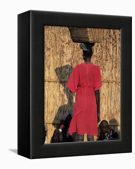 Back View of a Nuer Woman Carrying a Wicker Cradle or Crib on Her Head, Ilubador State, Ethiopia-Bruno Barbier-Framed Premier Image Canvas