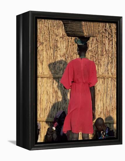 Back View of a Nuer Woman Carrying a Wicker Cradle or Crib on Her Head, Ilubador State, Ethiopia-Bruno Barbier-Framed Premier Image Canvas