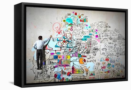 Back View of Businessman Drawing Sketch on Wall-Sergey Nivens-Framed Premier Image Canvas