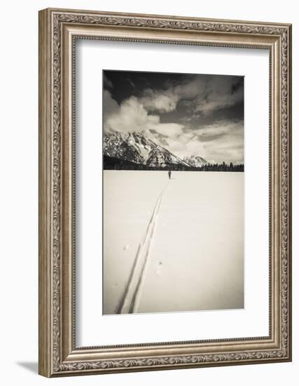 Backcountry skier under Mount Moran, Grand Teton National Park, Wyoming, USA-Russ Bishop-Framed Photographic Print