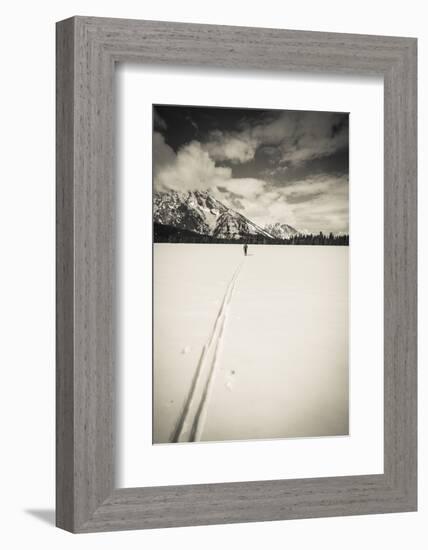 Backcountry skier under Mount Moran, Grand Teton National Park, Wyoming, USA-Russ Bishop-Framed Photographic Print