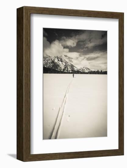 Backcountry skier under Mount Moran, Grand Teton National Park, Wyoming, USA-Russ Bishop-Framed Photographic Print