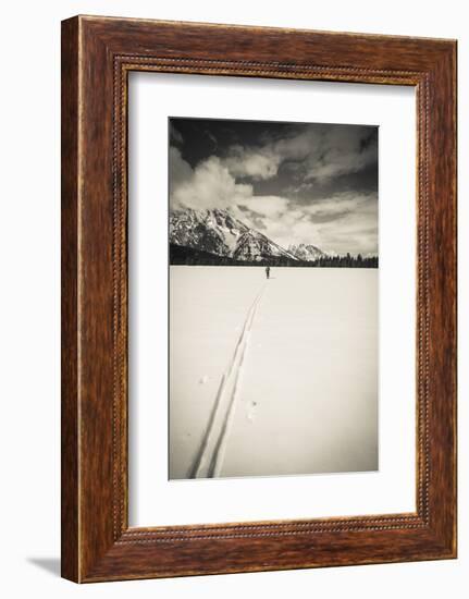 Backcountry skier under Mount Moran, Grand Teton National Park, Wyoming, USA-Russ Bishop-Framed Photographic Print