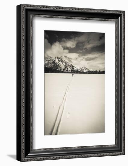 Backcountry skier under Mount Moran, Grand Teton National Park, Wyoming, USA-Russ Bishop-Framed Photographic Print