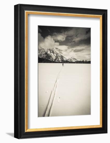 Backcountry skier under Mount Moran, Grand Teton National Park, Wyoming, USA-Russ Bishop-Framed Photographic Print