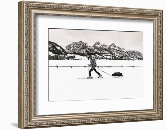 Backcountry skier under the Tetons, Grand Teton National Park, Wyoming, USA-Russ Bishop-Framed Photographic Print