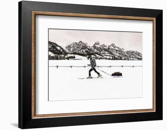 Backcountry skier under the Tetons, Grand Teton National Park, Wyoming, USA-Russ Bishop-Framed Photographic Print