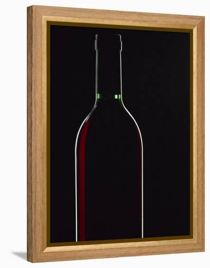 Backlit Shot of a Bottle of Red Wine-Lee Frost-Framed Premier Image Canvas