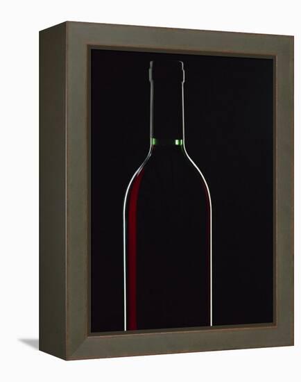 Backlit Shot of a Bottle of Red Wine-Lee Frost-Framed Premier Image Canvas