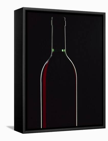 Backlit Shot of a Bottle of Red Wine-Lee Frost-Framed Premier Image Canvas