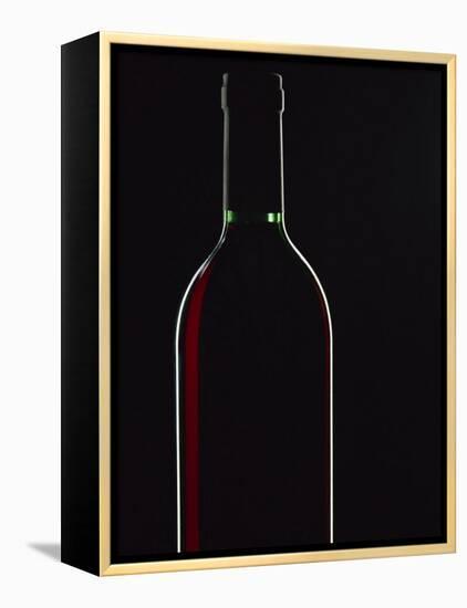 Backlit Shot of a Bottle of Red Wine-Lee Frost-Framed Premier Image Canvas