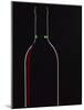 Backlit Shot of a Bottle of Red Wine-Lee Frost-Mounted Photographic Print