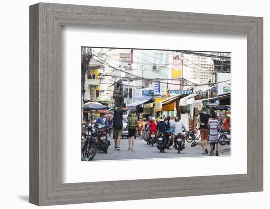 Backpackers on City Street, Ho Chi Minh City (Saigon), Vietnam, Indochina, Southeast Asia, Asia-Christian Kober-Framed Photographic Print