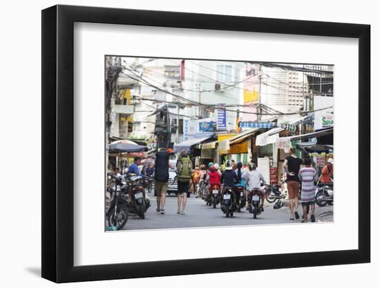 Backpackers on City Street, Ho Chi Minh City (Saigon), Vietnam, Indochina, Southeast Asia, Asia-Christian Kober-Framed Photographic Print