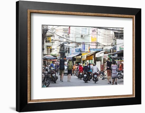 Backpackers on City Street, Ho Chi Minh City (Saigon), Vietnam, Indochina, Southeast Asia, Asia-Christian Kober-Framed Photographic Print