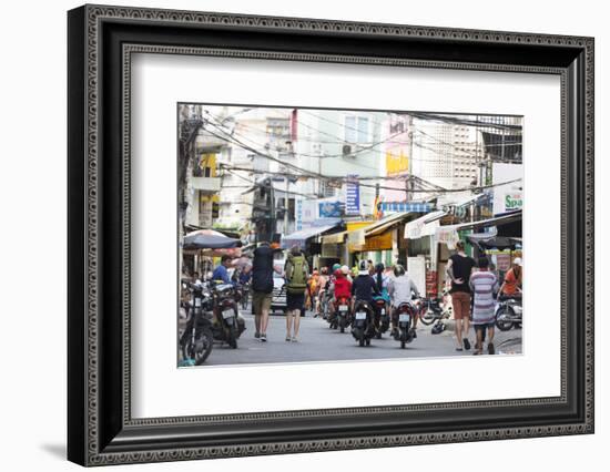 Backpackers on City Street, Ho Chi Minh City (Saigon), Vietnam, Indochina, Southeast Asia, Asia-Christian Kober-Framed Photographic Print