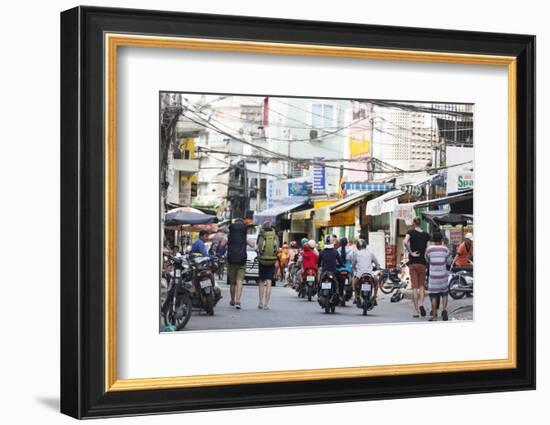 Backpackers on City Street, Ho Chi Minh City (Saigon), Vietnam, Indochina, Southeast Asia, Asia-Christian Kober-Framed Photographic Print