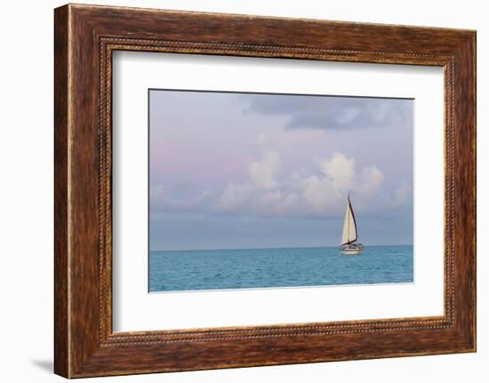 Bahamas, Exuma Island. Sailboat at Sunset-Don Paulson-Framed Photographic Print