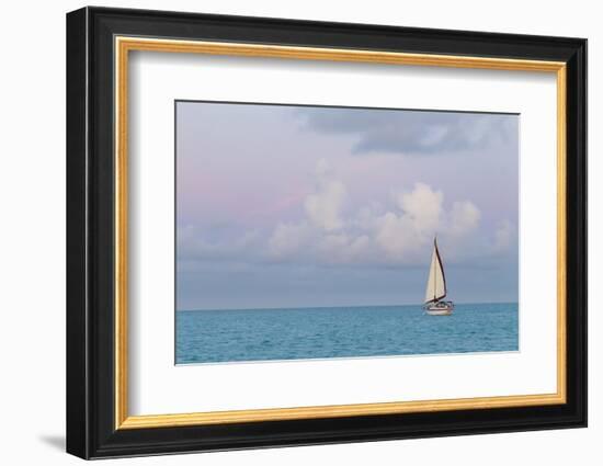 Bahamas, Exuma Island. Sailboat at Sunset-Don Paulson-Framed Photographic Print