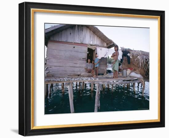 Bajau Family in Stilt House Over the Sea, with Fish Drying on Platform Outside, Sabah, Malaysia-Lousie Murray-Framed Photographic Print