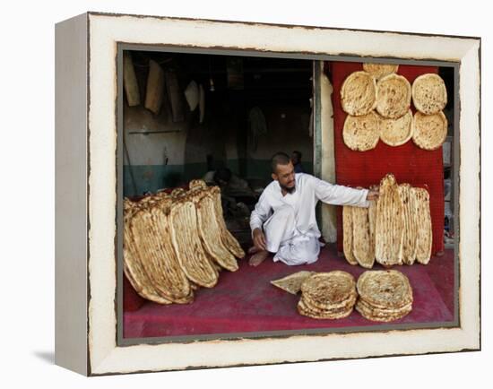 Baker Arranges Breads at His Shop in Kandahar Province, South of Kabul, Afghanistan-null-Framed Premier Image Canvas