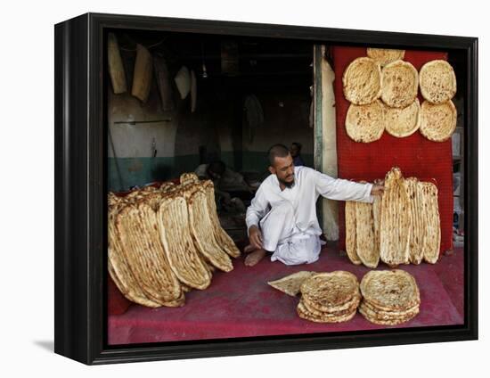 Baker Arranges Breads at His Shop in Kandahar Province, South of Kabul, Afghanistan-null-Framed Premier Image Canvas