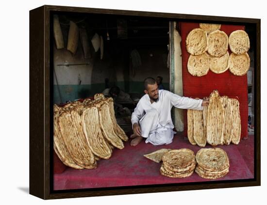 Baker Arranges Breads at His Shop in Kandahar Province, South of Kabul, Afghanistan-null-Framed Premier Image Canvas