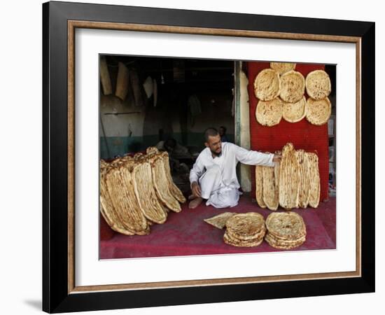 Baker Arranges Breads at His Shop in Kandahar Province, South of Kabul, Afghanistan-null-Framed Photographic Print