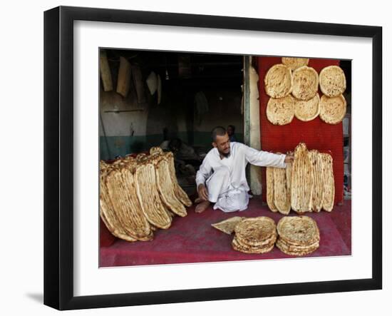 Baker Arranges Breads at His Shop in Kandahar Province, South of Kabul, Afghanistan-null-Framed Photographic Print