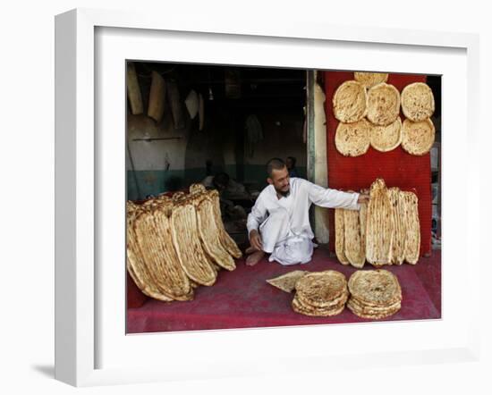 Baker Arranges Breads at His Shop in Kandahar Province, South of Kabul, Afghanistan-null-Framed Photographic Print