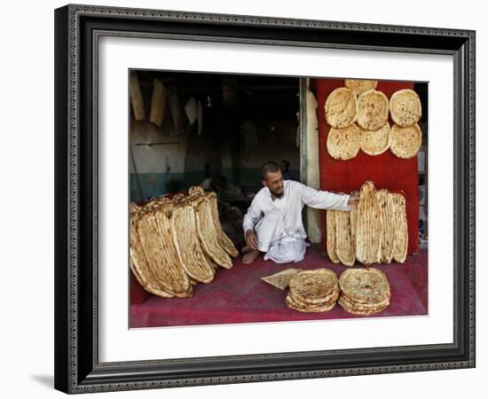 Baker Arranges Breads at His Shop in Kandahar Province, South of Kabul, Afghanistan-null-Framed Photographic Print