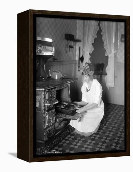 Baking Bread at Home for School Project, ca. 1914-null-Framed Premier Image Canvas