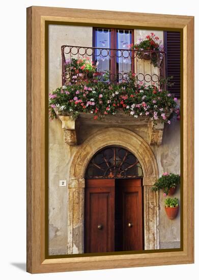 Balcony Flowers and Doorway in Pienza Tuscany Italy-Julian Castle-Framed Stretched Canvas