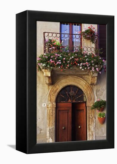 Balcony Flowers and Doorway in Pienza Tuscany Italy-Julian Castle-Framed Stretched Canvas