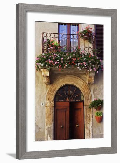 Balcony Flowers and Doorway in Pienza Tuscany Italy-Julian Castle-Framed Photo