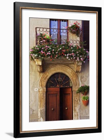 Balcony Flowers and Doorway in Pienza Tuscany Italy-Julian Castle-Framed Photo