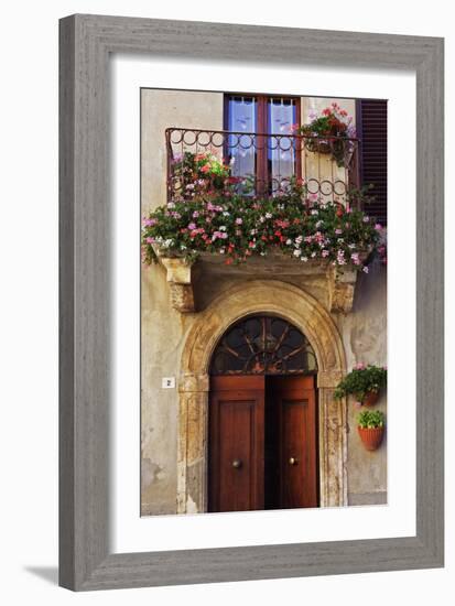 Balcony Flowers and Doorway in Pienza Tuscany Italy-Julian Castle-Framed Photo