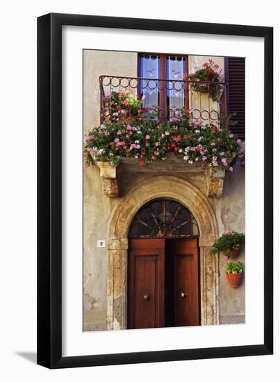 Balcony Flowers and Doorway in Pienza Tuscany Italy-Julian Castle-Framed Photo