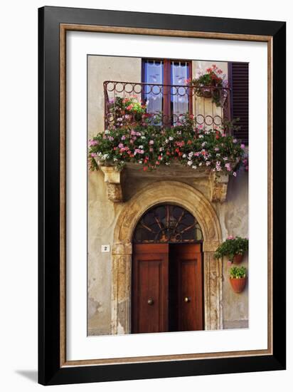 Balcony Flowers and Doorway in Pienza Tuscany Italy-Julian Castle-Framed Photo