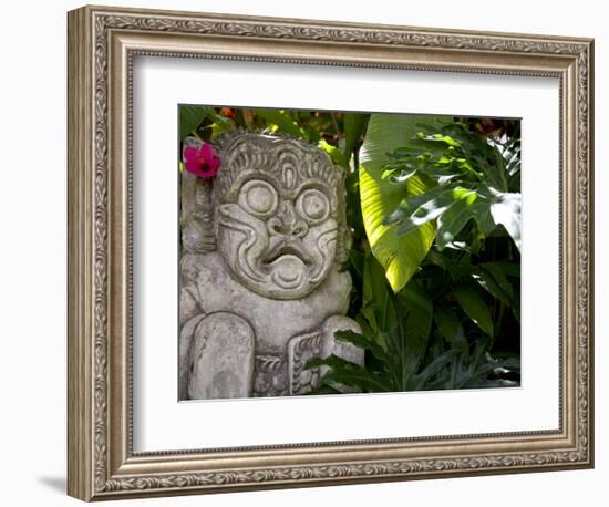 Bali, Ubud, a Stone Carving, Adorned with a Hibiscus Flower, Sits in Tropical Gardens-Niels Van Gijn-Framed Photographic Print